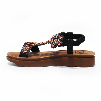 Sandalia NOMADAS con Flores y Elástico Negra de Dama